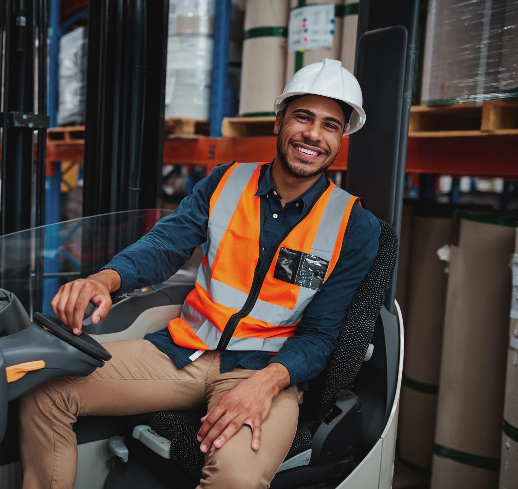 Workman sitting in a forklift